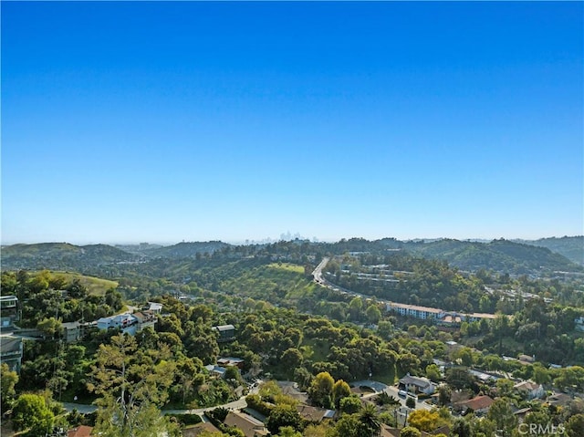 birds eye view of property featuring a mountain view