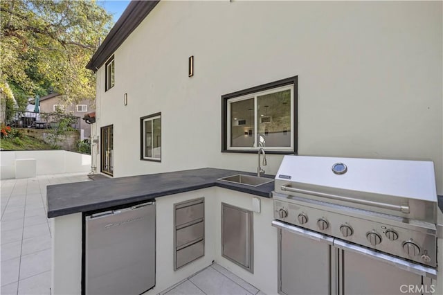 view of patio / terrace with a sink, grilling area, and area for grilling