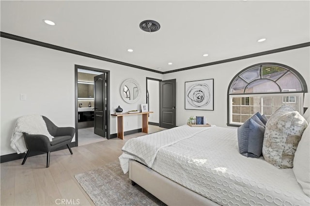 bedroom featuring recessed lighting, wood finished floors, baseboards, and ornamental molding