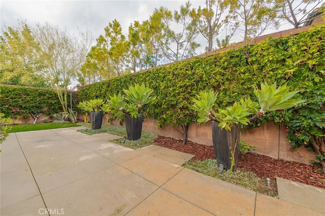 view of patio featuring a fenced backyard