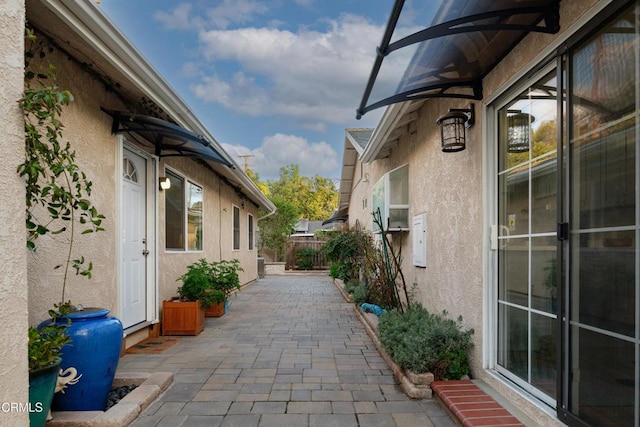 view of patio featuring fence