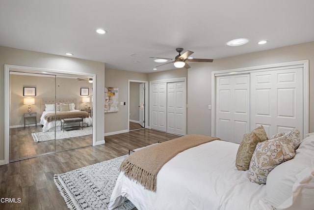 bedroom featuring baseboards, multiple closets, recessed lighting, wood finished floors, and a ceiling fan