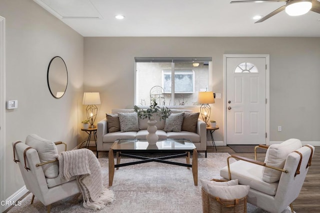 living area featuring ceiling fan, baseboards, wood finished floors, and recessed lighting