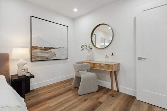 bedroom featuring recessed lighting, baseboards, and wood finished floors