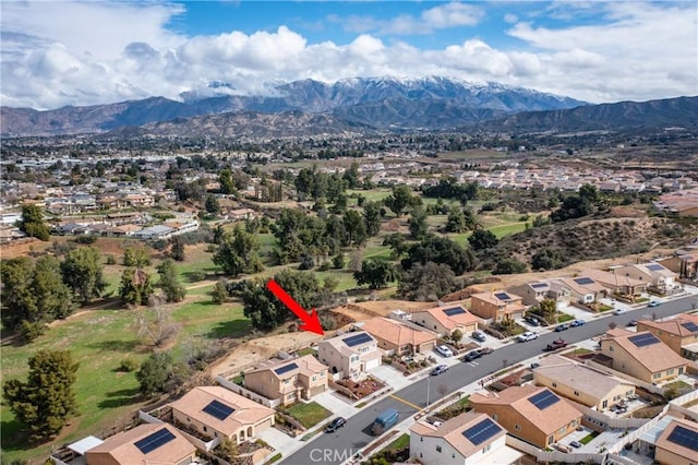 birds eye view of property featuring a mountain view and a residential view