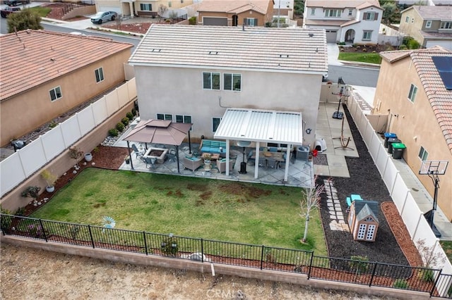 birds eye view of property with a residential view