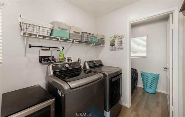 244 Country Club Dr, Calimesa, CA 92320 - washroom featuring washing machine and clothes dryer, wood finished floors, and baseboards