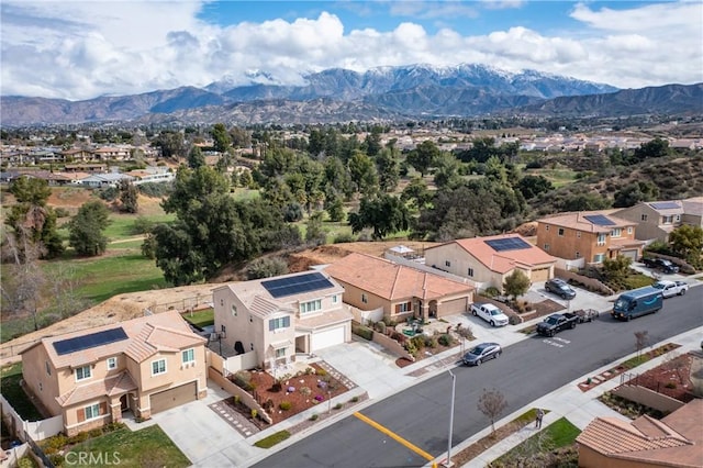 bird's eye view featuring a residential view and a mountain view