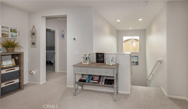 hall featuring recessed lighting, baseboards, an upstairs landing, and carpet flooring