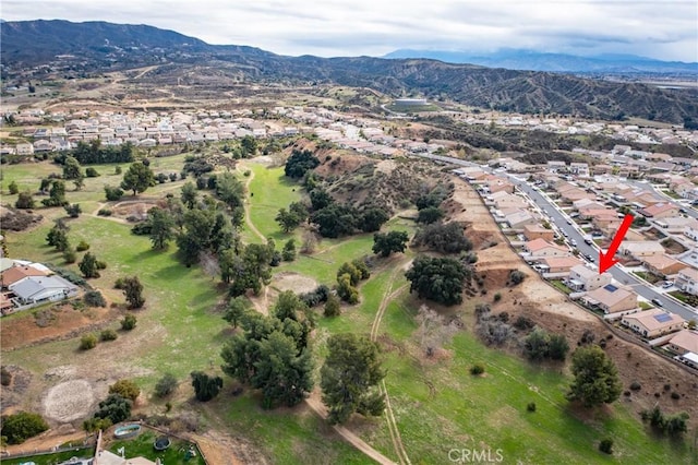 bird's eye view with a residential view and a mountain view