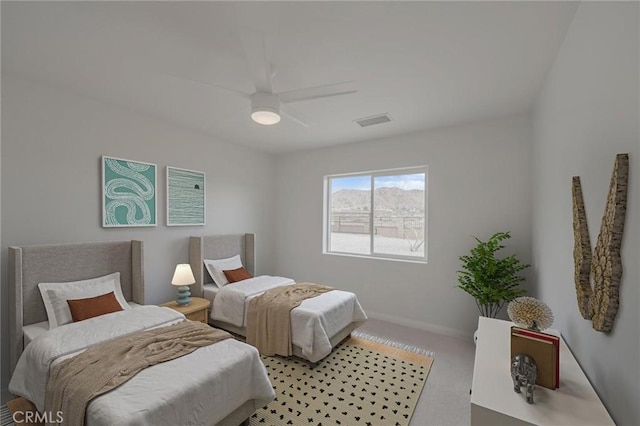 bedroom with visible vents, baseboards, and ceiling fan