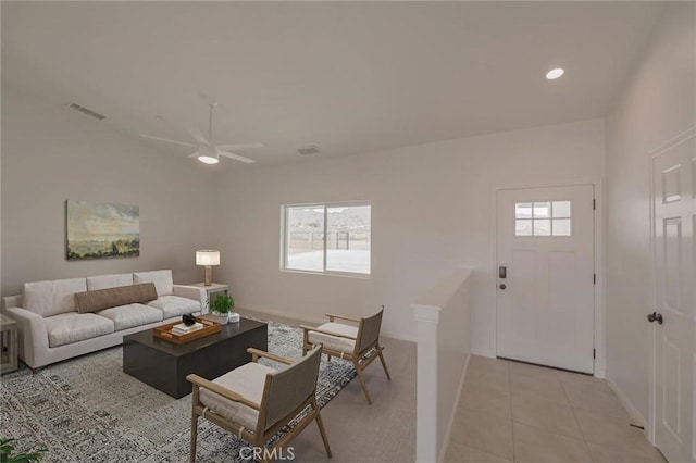 living room featuring recessed lighting, visible vents, light tile patterned flooring, and a ceiling fan