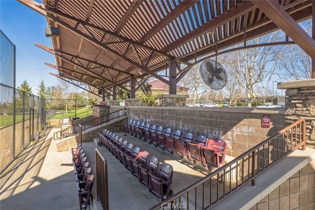 view of patio featuring fence