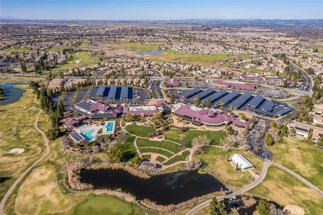 birds eye view of property with a residential view and a water view