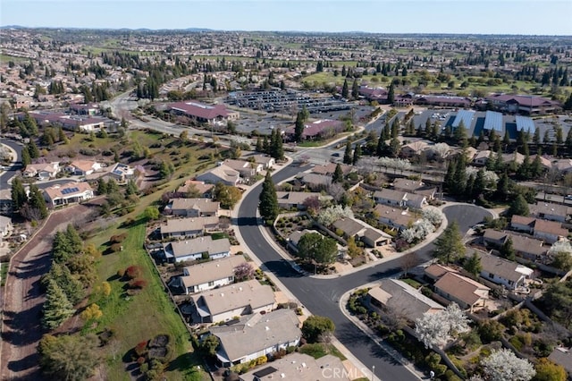 birds eye view of property with a residential view