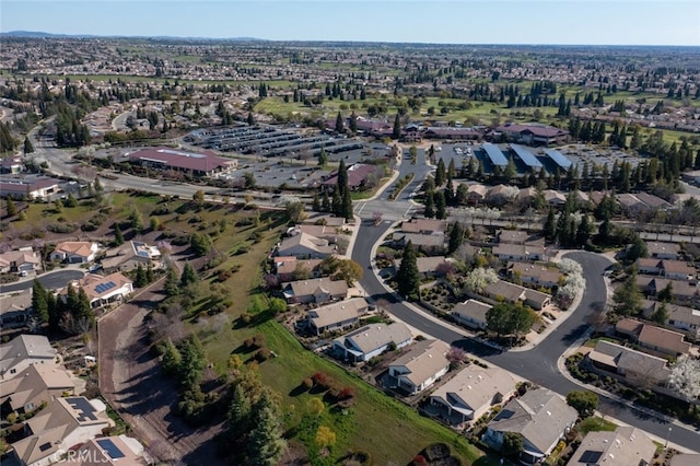 birds eye view of property with a residential view