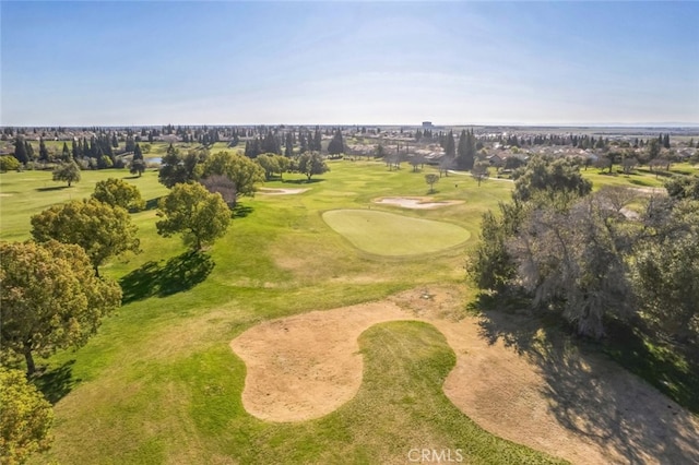 birds eye view of property featuring golf course view