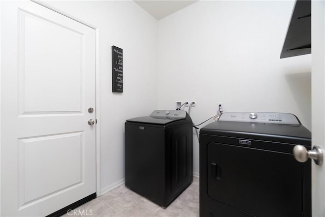 laundry area featuring laundry area and independent washer and dryer