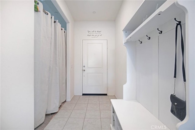 mudroom featuring light tile patterned flooring