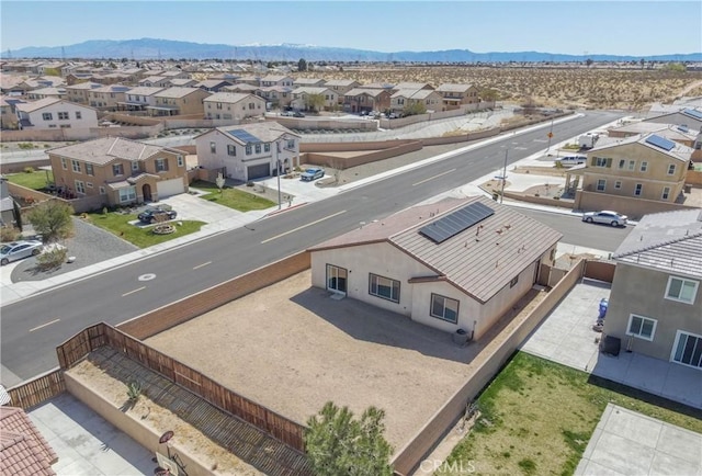 drone / aerial view with a mountain view and a residential view