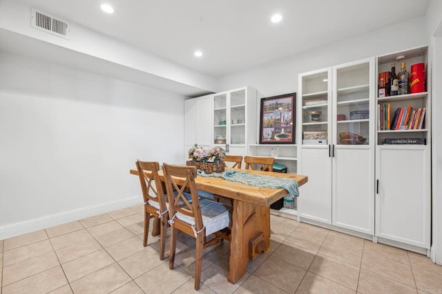 dining space featuring light tile patterned floors, visible vents, recessed lighting, and baseboards