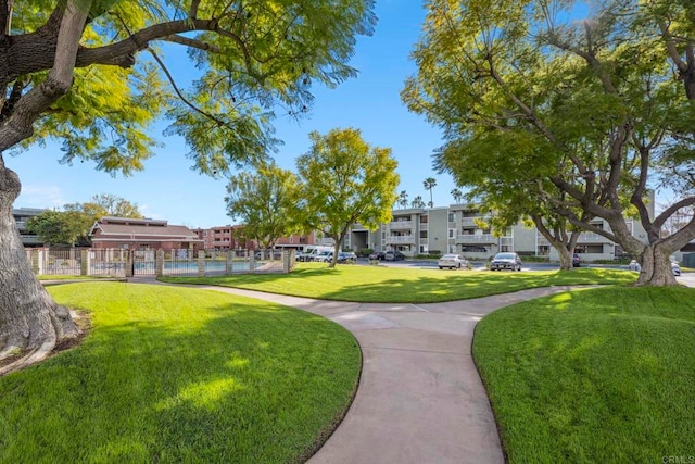 surrounding community featuring a lawn