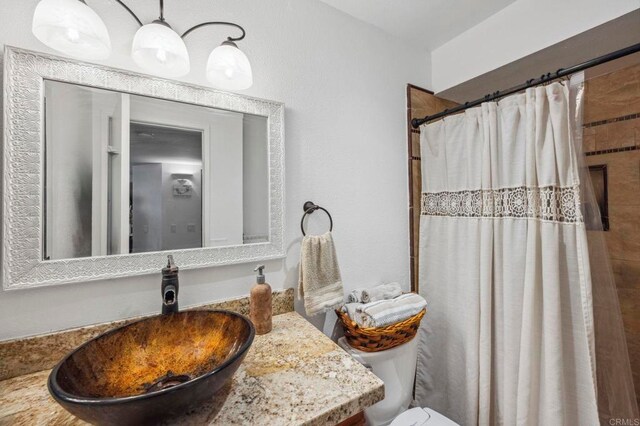 1020 E Washington Ave Unit 88, Escondido, CA 92025 - bathroom with vanity and a shower with curtain