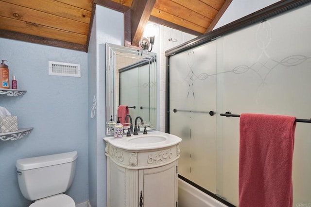 bathroom with visible vents, bath / shower combo with glass door, toilet, lofted ceiling, and vanity