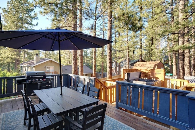 wooden deck with outdoor dining area