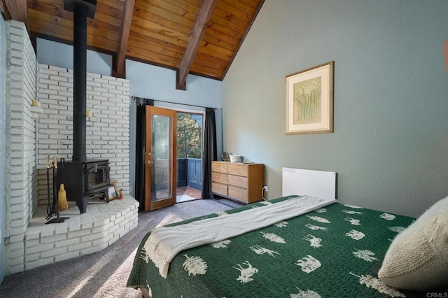 carpeted bedroom with beamed ceiling, high vaulted ceiling, a wood stove, wooden ceiling, and access to outside