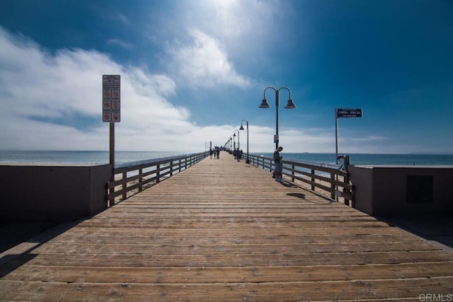 view of dock with a water view