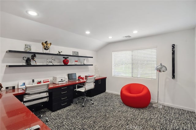 home office with vaulted ceiling, recessed lighting, visible vents, and dark carpet