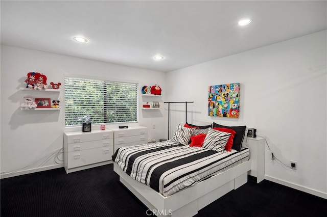 bedroom with recessed lighting, baseboards, and dark colored carpet