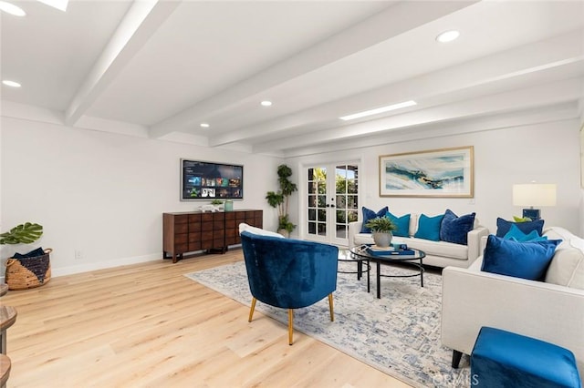 living area with beam ceiling, wood finished floors, recessed lighting, french doors, and baseboards