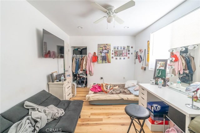 bedroom featuring recessed lighting, a ceiling fan, and wood finished floors