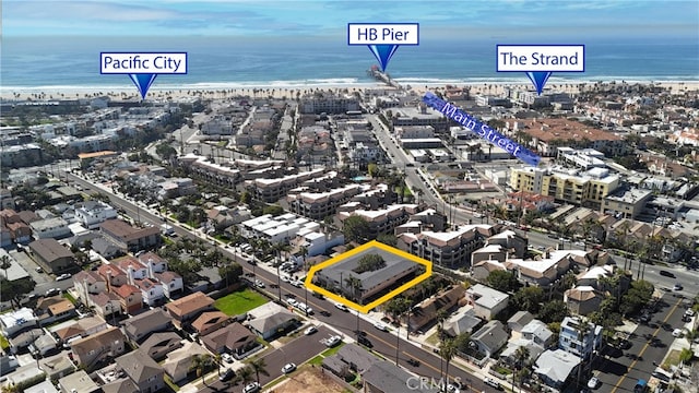 drone / aerial view with a view of the beach and a water view