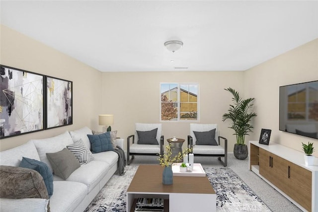 living area with light colored carpet