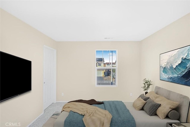 bedroom featuring carpet flooring, baseboards, and visible vents