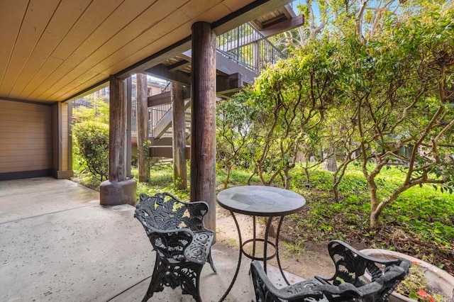 view of patio / terrace featuring stairs