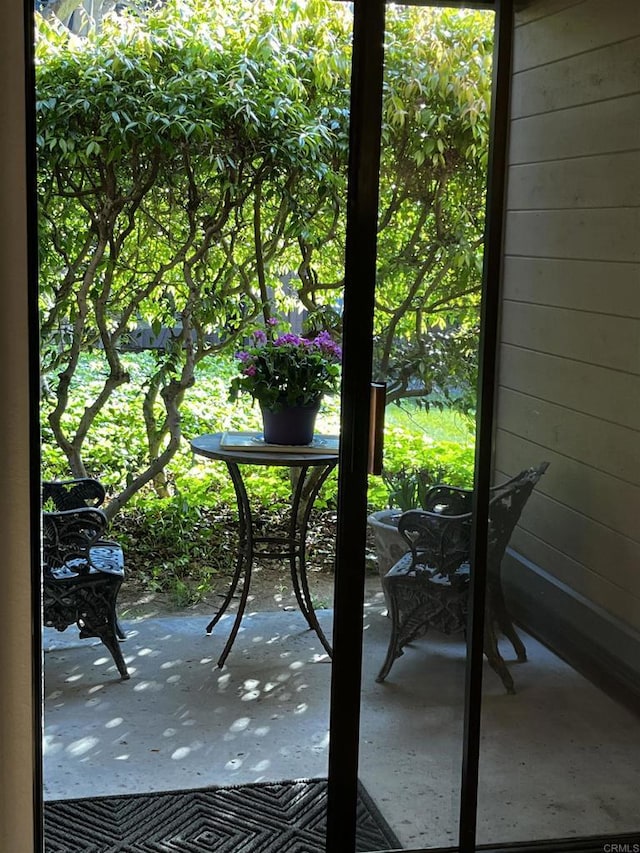 4015 Canario St Unit D, Carlsbad, CA 92008 - doorway to outside featuring wooden walls