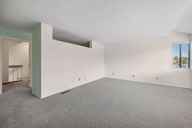 4015 Canario St Unit D, Carlsbad, CA 92008 - empty room featuring carpet flooring and a textured ceiling
