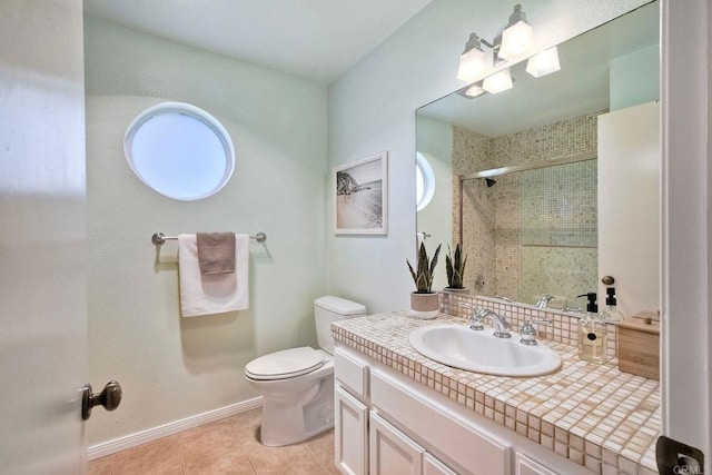 4015 Canario St Unit D, Carlsbad, CA 92008 - bathroom with tile patterned flooring, tiled shower, and vanity