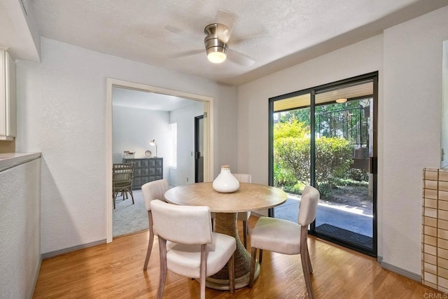 4015 Canario St Unit D, Carlsbad, CA 92008 - dining area featuring a ceiling fan and light wood-style floors
