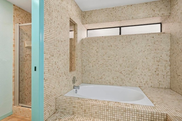 4015 Canario St Unit D, Carlsbad, CA 92008 - full bath featuring a bath, a stall shower, tile patterned flooring, and tile walls