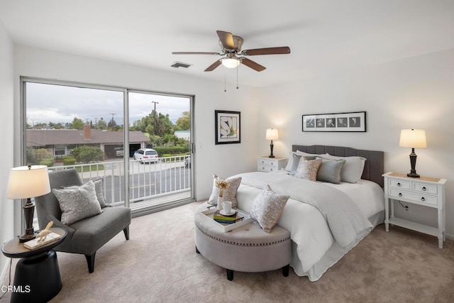 bedroom with visible vents, carpet floors, access to exterior, and a ceiling fan