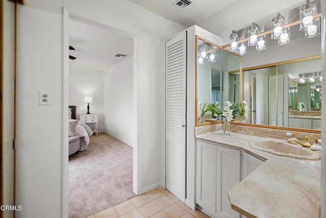 full bath with tile patterned floors, visible vents, a closet, and connected bathroom