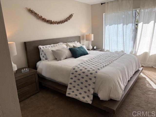 bedroom featuring carpet floors