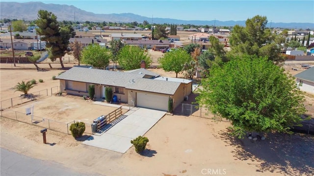 aerial view featuring a residential view and a mountain view