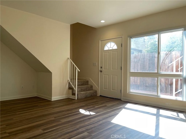 entrance foyer with stairway, recessed lighting, wood finished floors, and baseboards