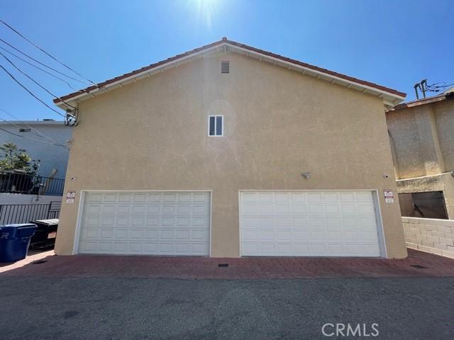 garage with fence